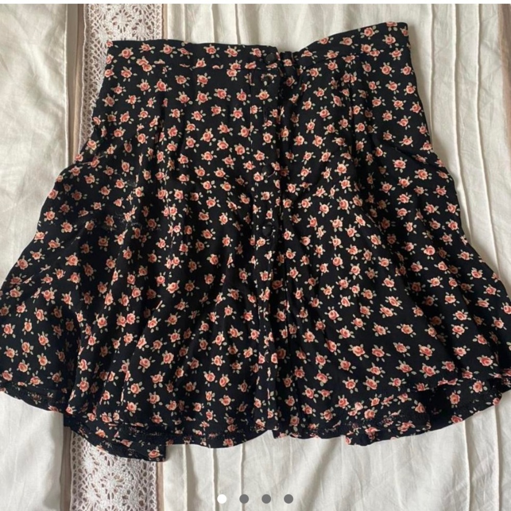 Floral brandy Melville / John galt mini skirt. Fits a size xs or small.